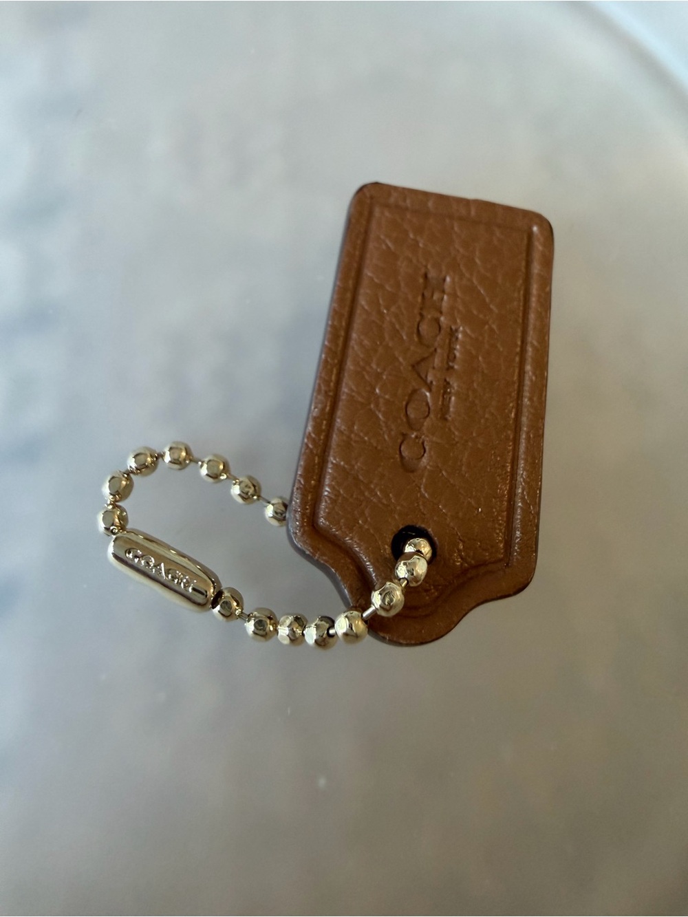 Coach New York Brown Hang Tag Leather with Gold Ball Chain Small